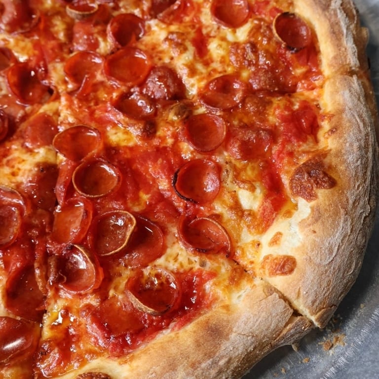 Savor our white pizza